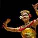 Balinese dancer Mira Collins performs during the Dicken Elementary School's Community of Cultures Assembly and Celebration on Friday, April 12. Collins' daughter attends the school and is in the second grade. AnnArbor.com I Daniel Brenner